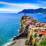 Scenic view of colorful village Vernazza and ocean coast in Cinque Terre, Italy